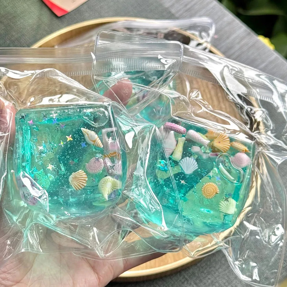 Ocean Glitter Squishy Cube - Slow Rise Ice Cube Stress Ball